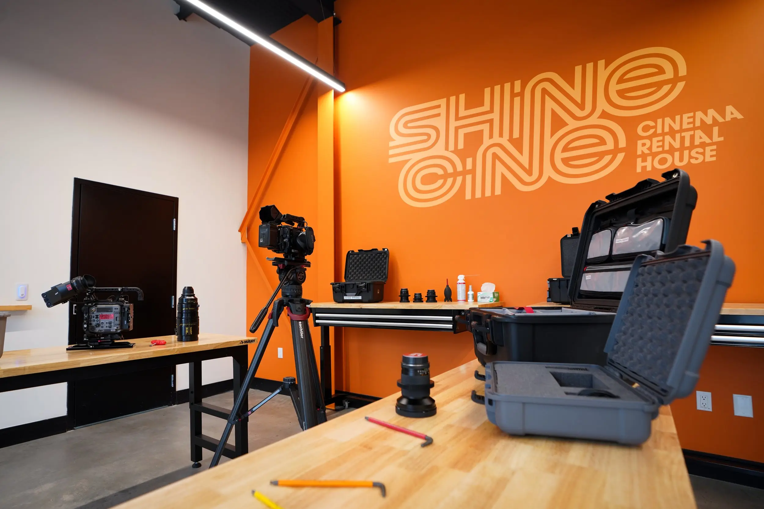 Shine Cine’s camera prep room with gear on carts